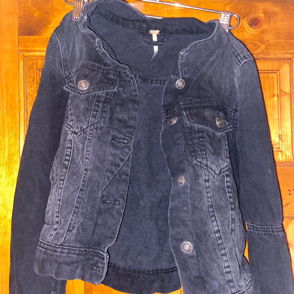 Faded black denim jacket by Free People
